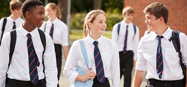 Image of secondary students walking in the playground